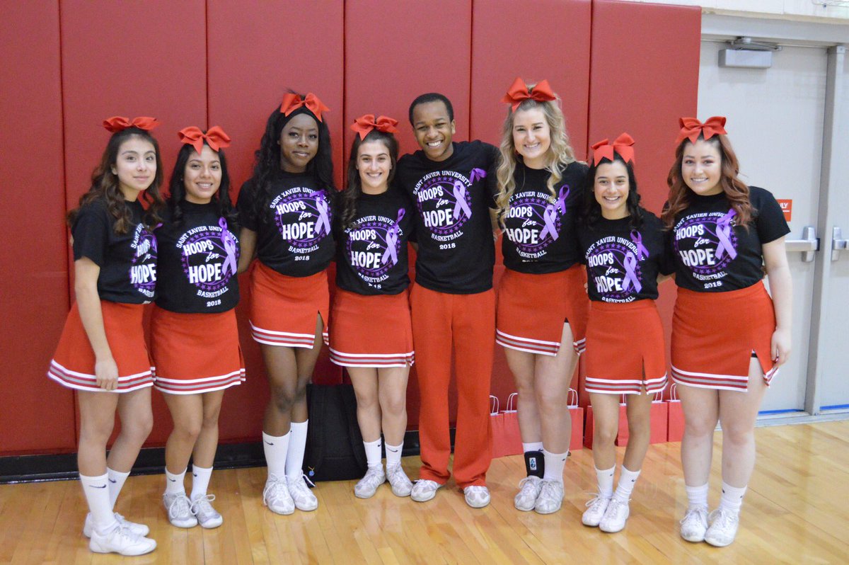SXUAthletics's tweet photo. The @SaintXavier WBB team &amp; @SXUCHEER team honored @sjcoverick before &amp; after today’s game for #hoopforhope! #gocougs🐾 #WeAreSXU https://t.co/eICLw6rBo2