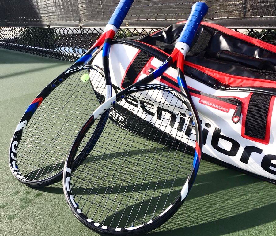 TattooedRunnr's tweet photo. Guess my day of hitting is done.  Strings in both rackets snapped! https://t.co/EUwyGEgPJ0