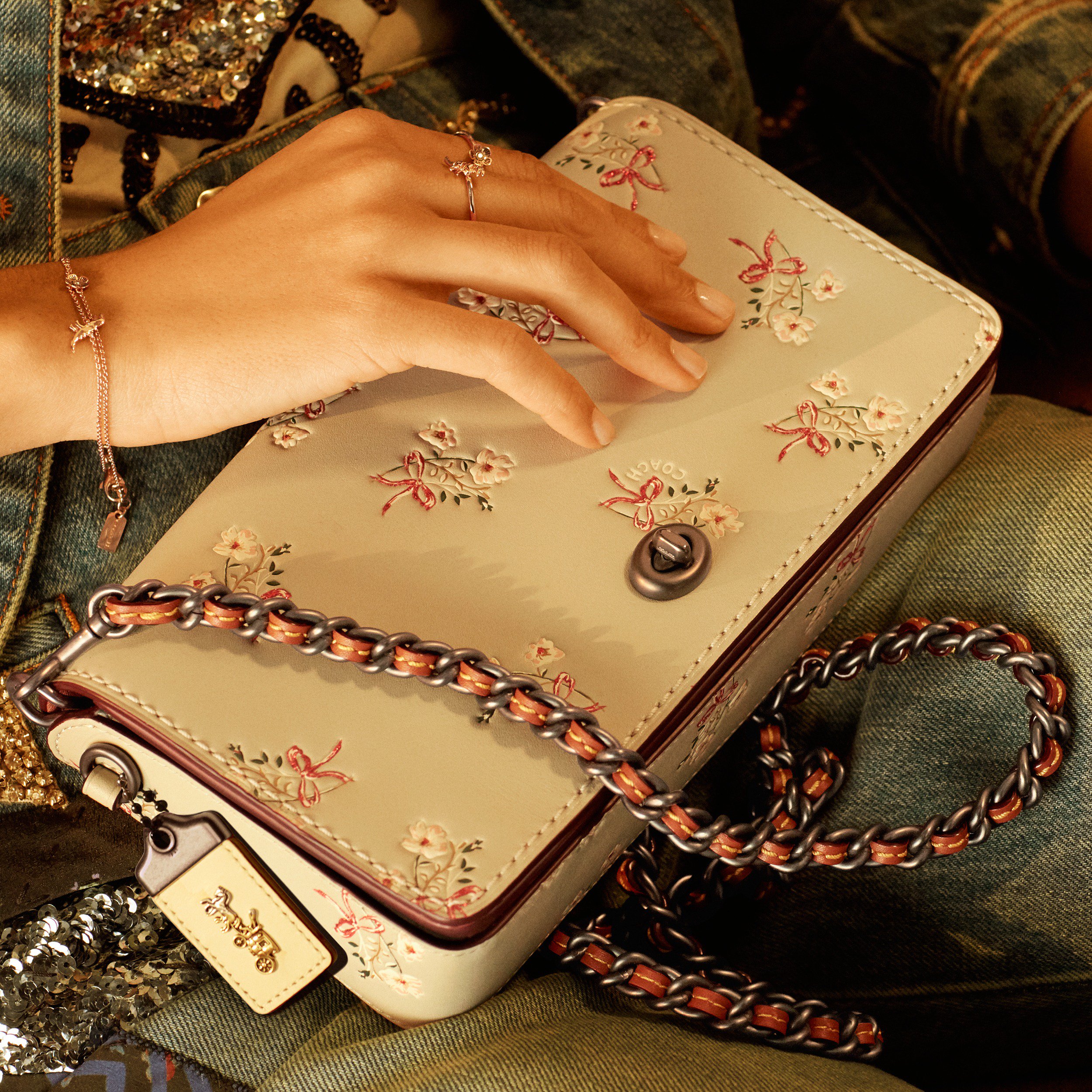 X Coach Pretty blooms. For spring the Dinky bag is