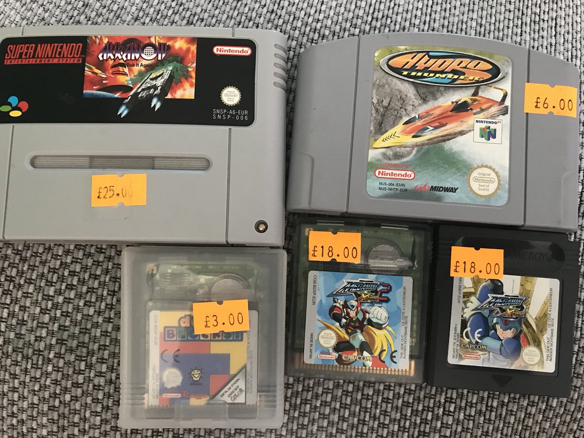 RetroBreakNick's tweet photo. Did a bit of game shopping in Birmingham yesterday! Great finds! #retrogaming #birmingham #gameshops #snes #N64 #gameboy #megaman https://t.co/HuOBhdl6Bu