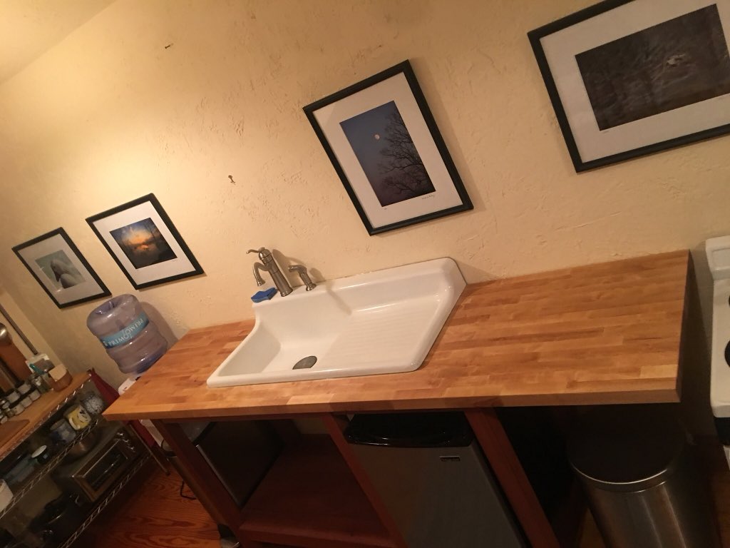 Designed and built this custom kitchen sink cabinet for a client that has a airBnB. The frame is made from Red Balau with a hard maple cutting board top and a reclaimed porcelain sink.  Our clients were awesome to work with and bought us lunch from a local seafood shop!!!!