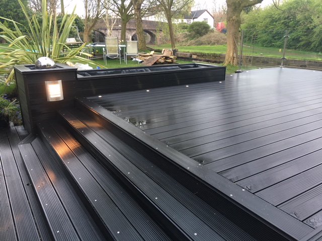 ultimatedecking's tweet photo. A project we completed in the Charcoal Composite deck board, looking spacious and modern 🔧👍 https://t.co/DtvfA0NVnd