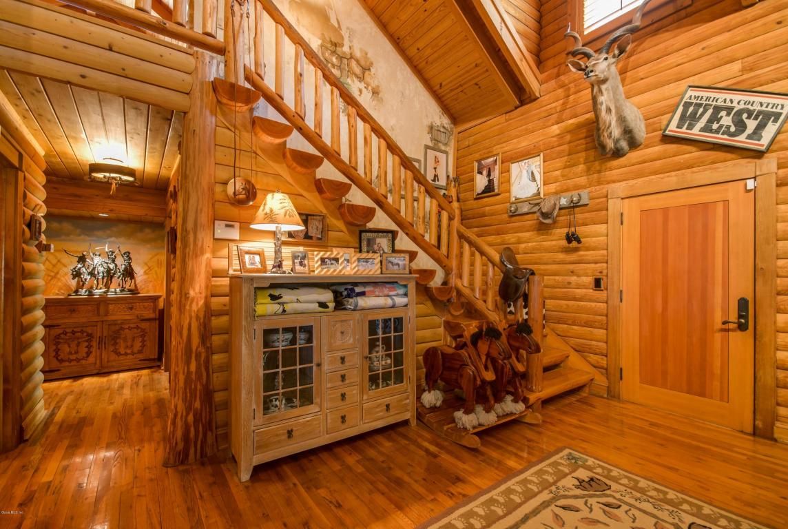 ShowcaseOcala's tweet photo. Levy Oaks Ranch sits on over 37 acres of serenity.  As you enter this #customlogcabin home your welcomed by its stone lined fireplace, open family room and beautifully designed chef’s kitchen perfect for entertaining. (360 Virtual Tour Available) https://t.co/yxg5xBn86l