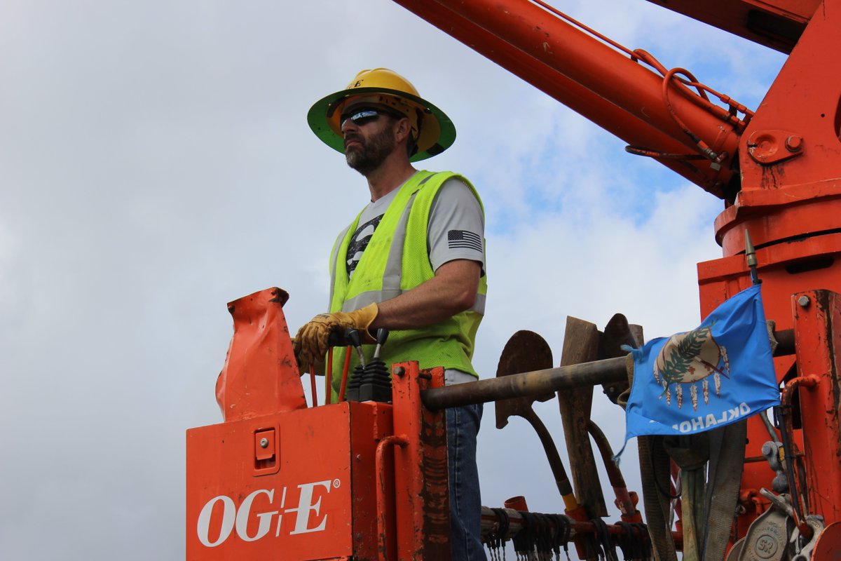 OGandE's tweet photo. #BigOrange up in the trees and down on the ground to restore power in Puerto Rico. #PoweringPR #IluminandoPR https://t.co/Z8wAHmuEhR