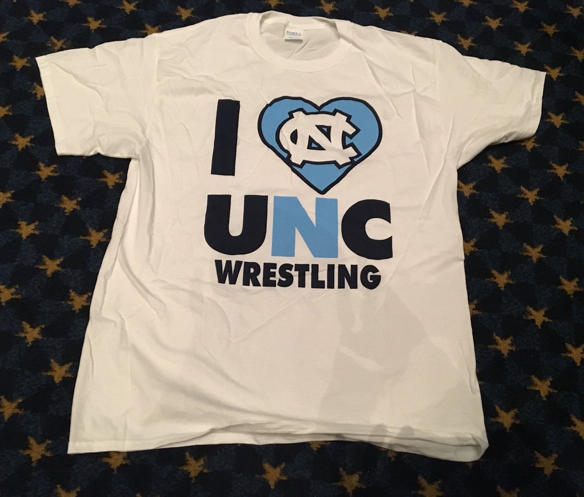 GoHeelsGameDay's tweet photo. Finishing touches for the #BrawlAtTheHall tonight at #MemorialHall @UNCWrestling vs @DukeWRES #FreeRoses #FreeTshirts #SeniorNight #MillionMealsChallenge #Parking at Venable #BeatDuke https://t.co/DuTqUnWDDN https://t.co/xavB6InFQf