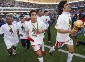 Tunisia's players celebrate their 2004 Africa Cup of Nations triumph.