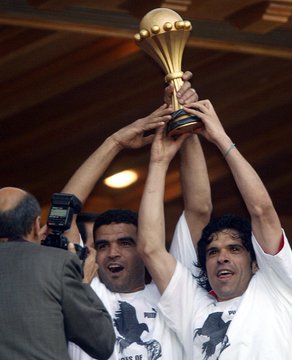 Tunisia's players celebrate their 2004 Africa Cup of Nations triumph.