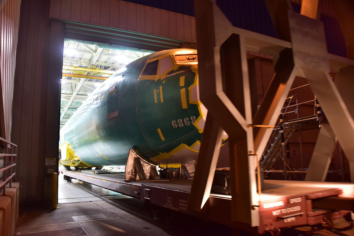 SpiritAero's tweet photo. The @BoeingAirplanes 737 fuselage has been built in Wichita since 1966. Yesterday, the 10,000th unit rolled off Spirit's production line and began its journey to Boeing's plant in Renton, WA. #WhereFlightBegins #GenerationsofExcellence https://t.co/S5GWLG08ci