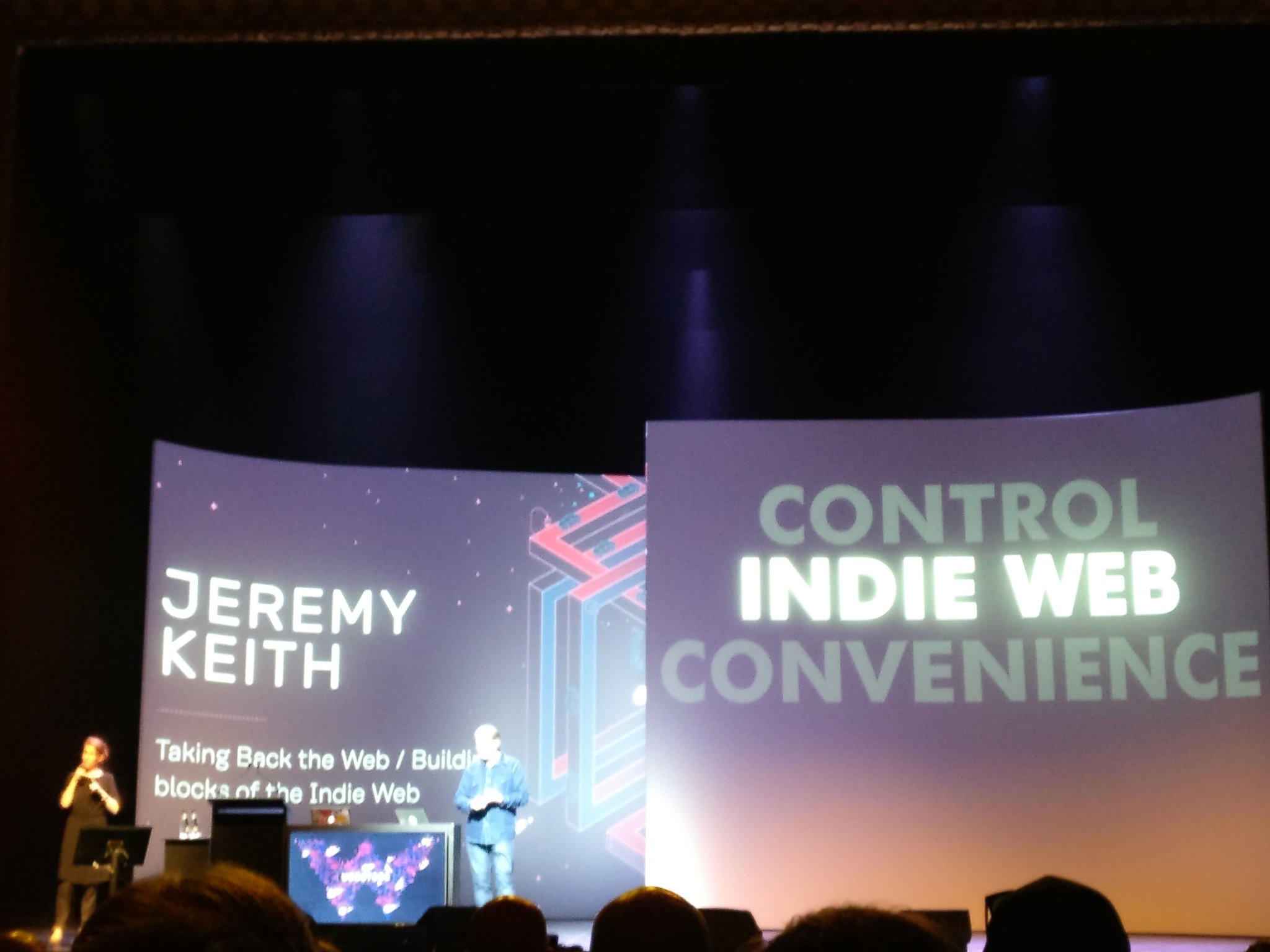 Photo of Jeremy Keith presenting “Building blocks of the Indie Web” as part of his Taking Back The Web speech. A big screen also displays the terms CONTROL, INDIE WEB, and CONVENIENCE, with Indie Web highlighted in the middle.