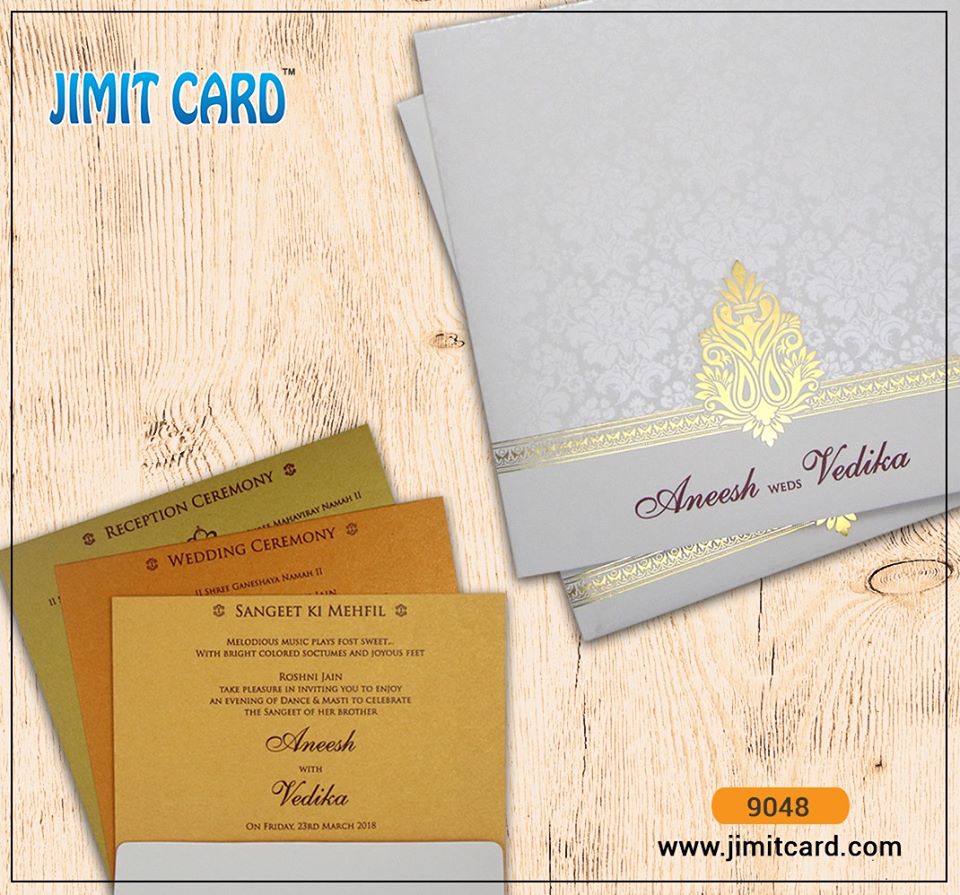 JimitCard's tweet photo. A Multifaith Indian #Weddingcard in ivory colour and at the bottom gold floral motifs printed with floral motifs design all over it. https://t.co/8BlVZNXm0j