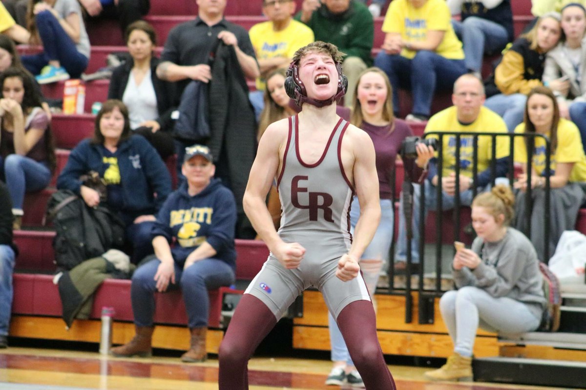 Mdavids23's tweet photo. Varsity Wrestling 🤼♀️ as a freshman and my younger brother seals the Victory and Regional Championship for the Eaton Rapids Greyhounds then hits the crowd with the #KCFlex @k4coleman @Panthers #Champs #OnToStates #BiggestFan https://t.co/Mcdf1W0One