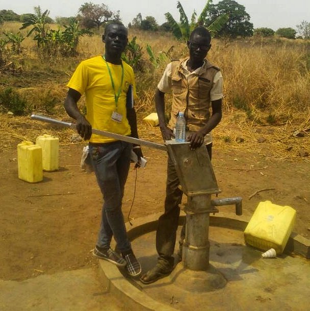 Field surveyors mapping water points. Michael Yani is part of the HOT Uganda Surveying team. Moses Alex is a boda rider from the current mapping area, his #localknowledge helps secure Michael through any unfamiliar terrain #motorcyclemapping #mappingteam #hotosm #collaboration