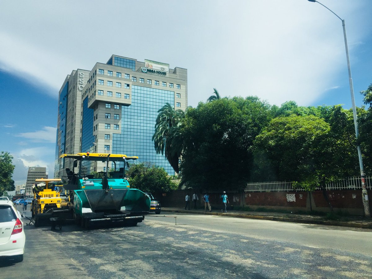 SmangaMad's tweet photo. Zim on the mend. @cohsunshinecity repairing roads in #CBD #ZimAtWork https://t.co/L6tp08b6OQ