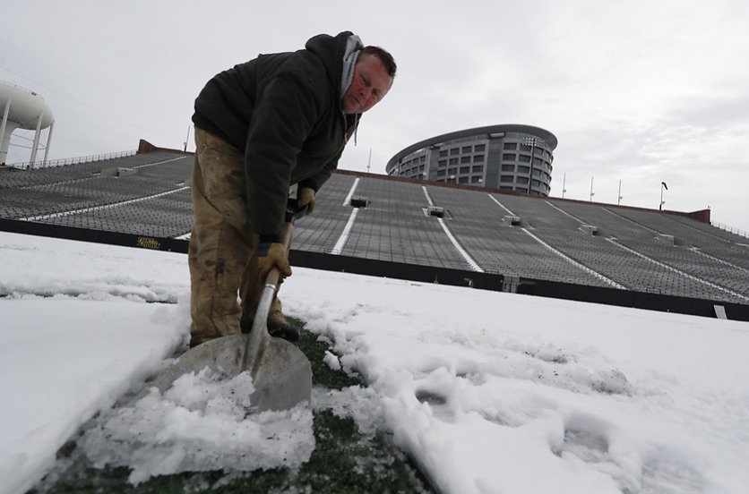 Something special is happening at Kinnick Stadium this morning. #SnowWave #FTK