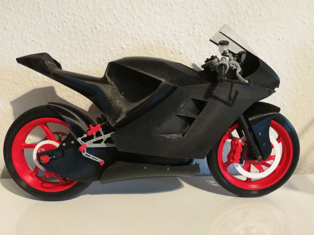 ETHMotoRacing's tweet photo. Here it is!
Team member Max has been very productive during the last weeks and the result is this awesome model of our bike, built from 3D-printed parts of our CAD-files. The suspension even works! 
We are very excited :D https://t.co/HsCQrfnddt