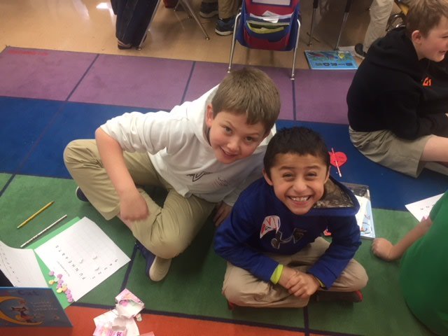 Ensworth's tweet photo. Grade 5 spent Valentine's Day with their friends at Charlotte Park Elementary School practicing mathematics with candy counting! #CoreSkillBuilding #ExcellenceInService https://t.co/KGQab9BMJs