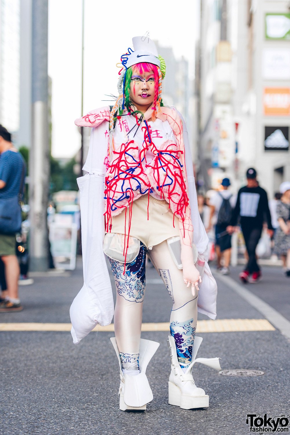 Tokyo Fashion on X: 17-year-old Japanese high school student @Sakuran_is_  on the street in Harajuku wearing an avant-garde outfit featuring handmade  fashion, Japanese Ukiyo-e tights, Koji Kuga boots & a randoseru #原宿