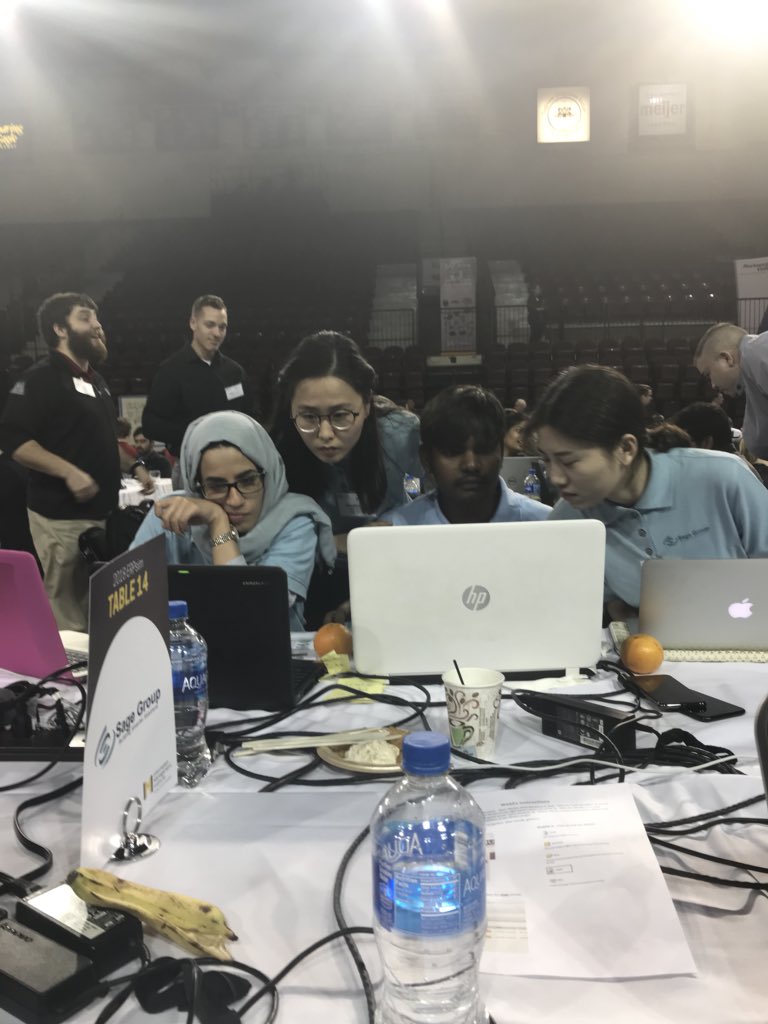 Paraf1cj's tweet photo. Team Sage Group planning out their next two rounds after moving up one spot to 7th in round 2! #cmuERPsim2018 #cmucba https://t.co/LFEaVXDGvJ