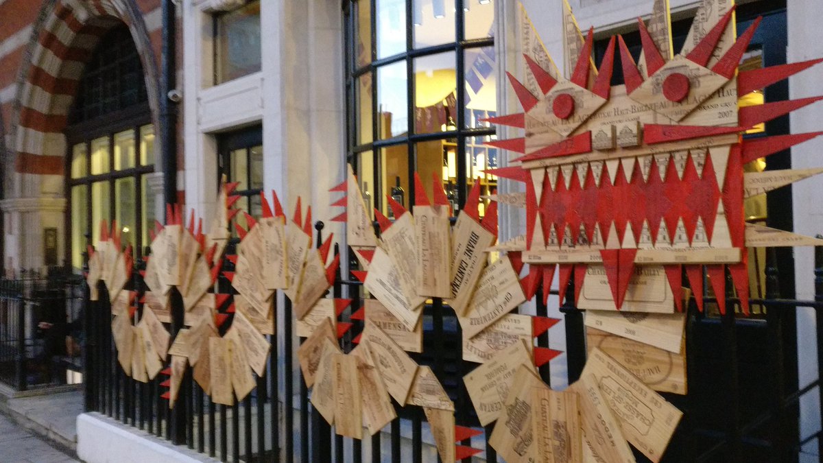 heysonar's tweet photo. For the first time in our 30+ years of working in London, Chinese New Year seems to be a thing. #SignOfTheTimes outside wine merchant Berry Bros. &amp; Rudd in St. James and at Westfield White City today. https://t.co/Psg5OKTXFE