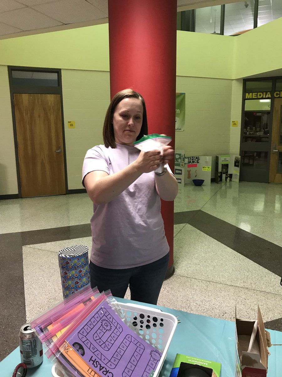 1stGrade210's tweet photo. Mrs. Foley was working that slime at the First Grade table during Sandy Grove’s STEAM night! #SGESDoves https://t.co/gbP7HIKUp9