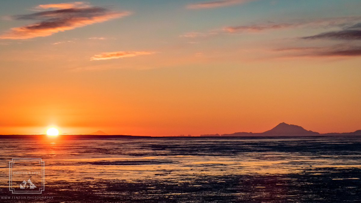 FentonPhoto's tweet photo. The #winter #sun setting into the cold #Alaskan #horizon with #MountRedoubt in #silhouette to the right. @VisitAnchorage #alaska  #landscapephotography https://t.co/5jACTTuLTV