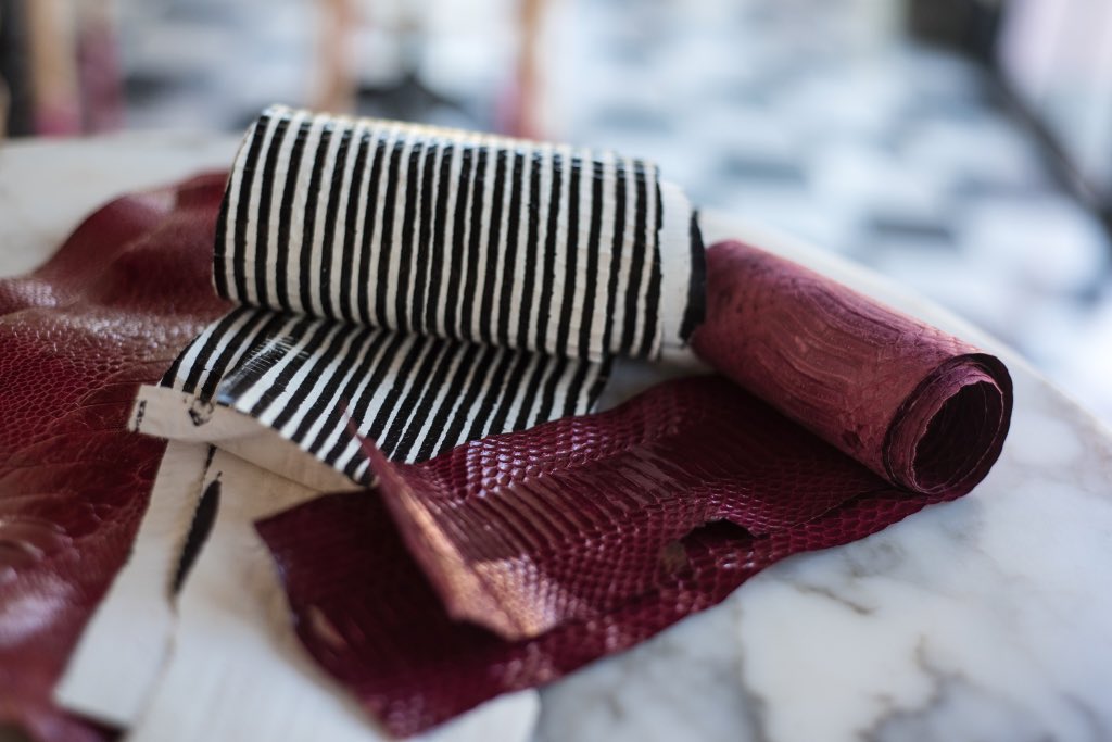 Hand picking the leathers based on scale, symmetry and how evenly the dye reflects. Natural, rare and precious 🙌🏼 #oneofakind #AdrianaCastro