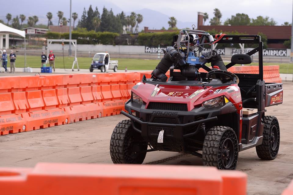 WalkmanRobot's tweet image. WALK-MAN driving the car in DARPA Challenge 2015 in the USA.