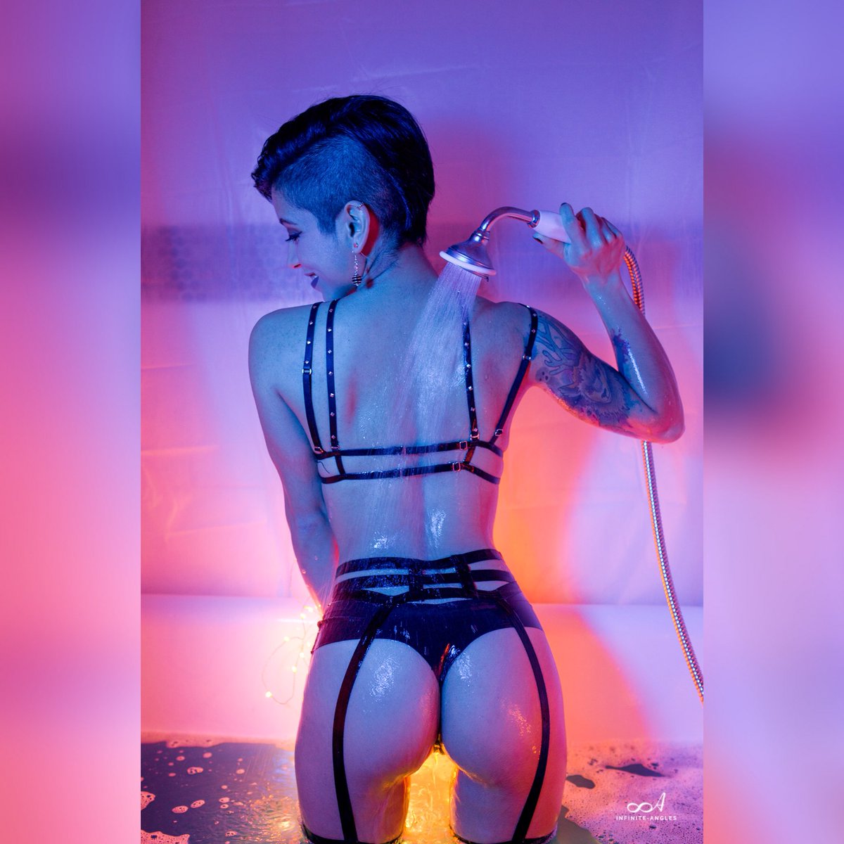 So many lovely images by @InfiniteAngles !! #booty🍑 #harness #harnessbra #harnessbralette #bodyharness #datcake #bathshoot #bathbomb #bathbombshoot #glowingskin #glowingwater #runningwater #wet #dripdripdrop #hereiam #tattedmodel #atx #austintx