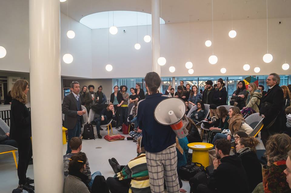 NewUvA's tweet photo. Yesterday, students and teachers took a nap in the A-hall of Roeterseiland since these budget cuts are putting our critical minds to sleep and the increasing work-pressure requires us to nap. https://t.co/AtHDFsaBi9