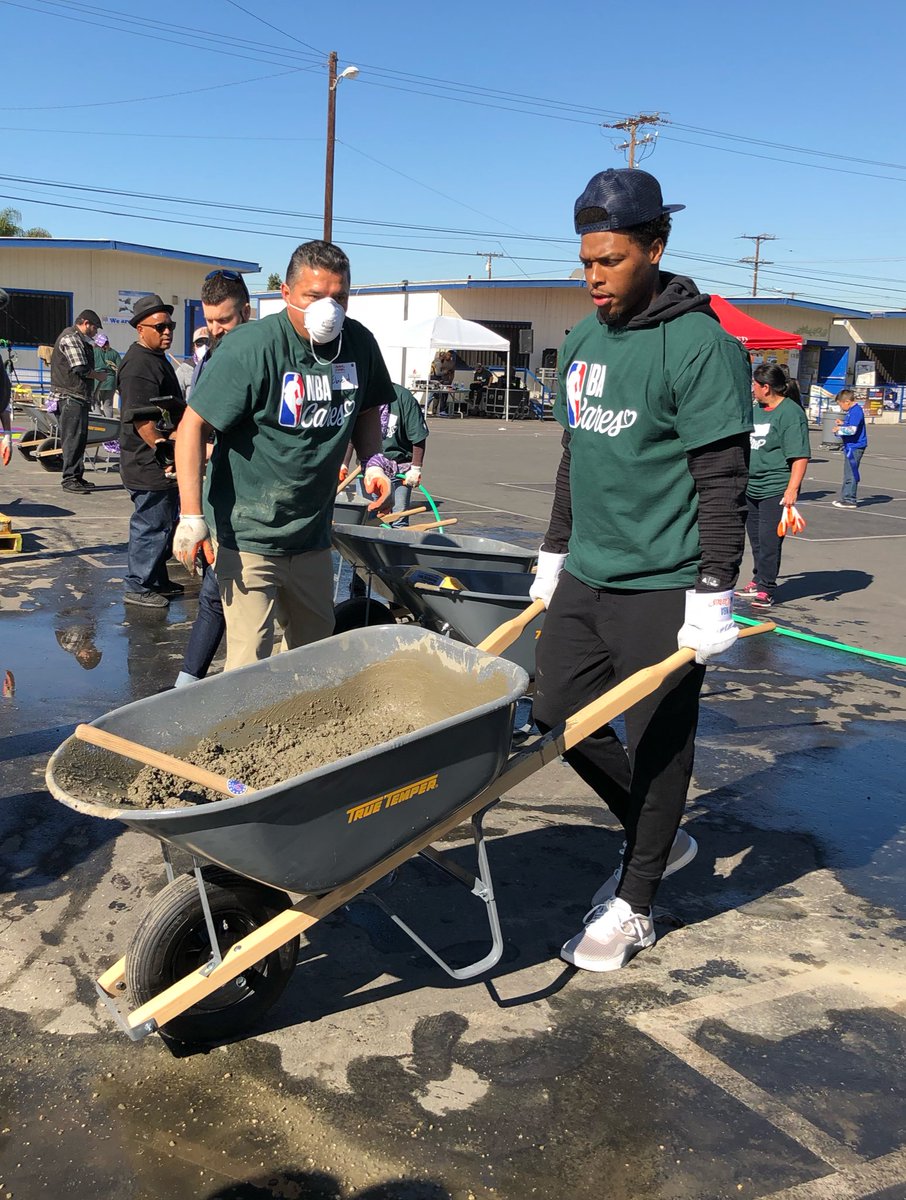 NBAAllStar's tweet photo. #NBAAllStar teammates @Klow7 and @DeMar_DeRozan help build the new playground with @kaboom at Jefferson Elementary! https://t.co/PfpVUT1Vtc