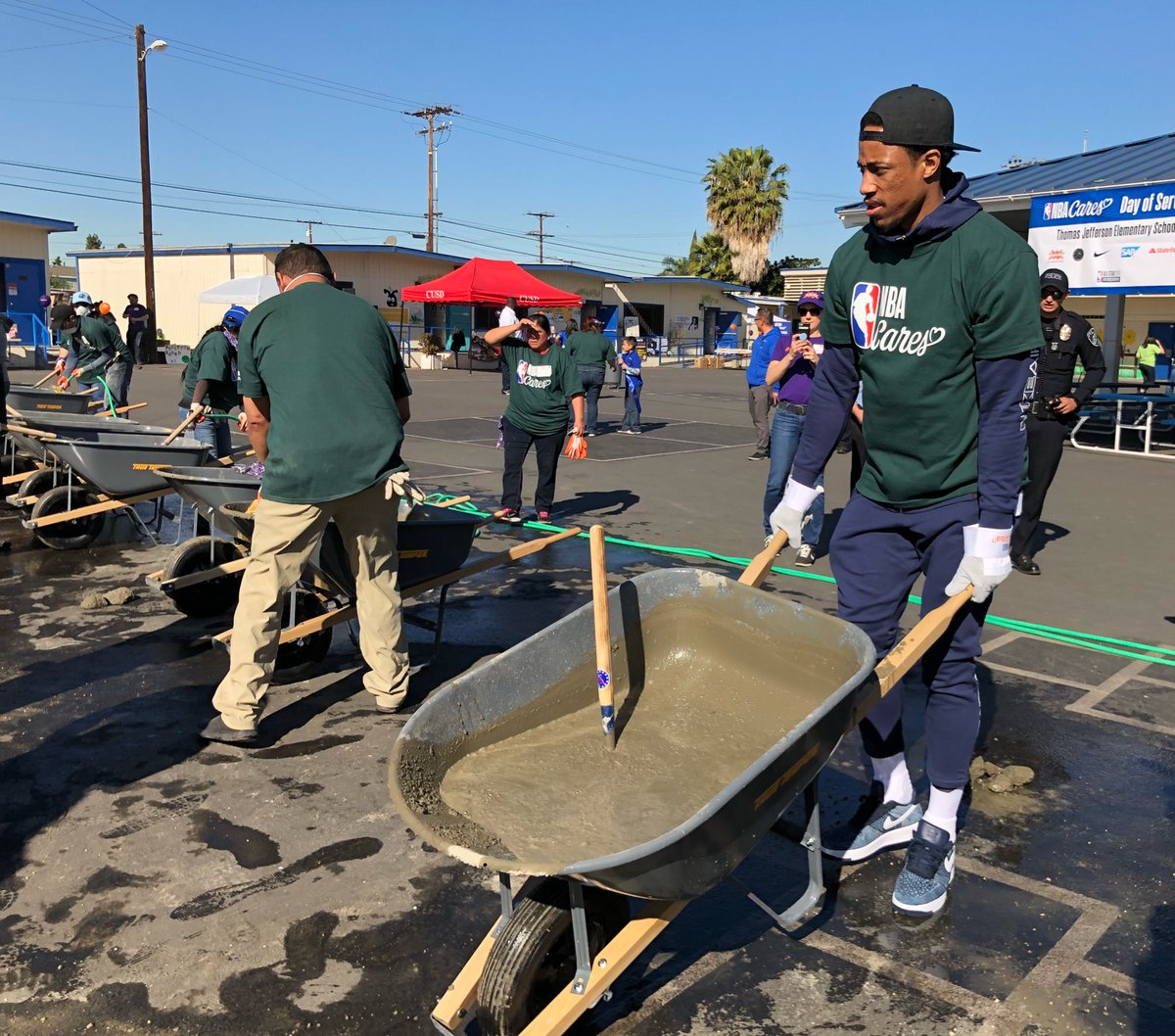 NBAAllStar's tweet photo. #NBAAllStar teammates @Klow7 and @DeMar_DeRozan help build the new playground with @kaboom at Jefferson Elementary! https://t.co/PfpVUT1Vtc