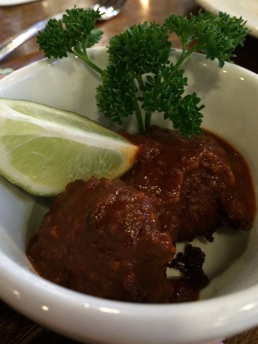 roamingwithjo's tweet photo. You can't tell... but under that red chile there are amazing fried balls of cheese with green chile! Found @BourbonGrillSFe for #NMRestaurantWeek starting Feb.18! https://t.co/m7W20f95Ky