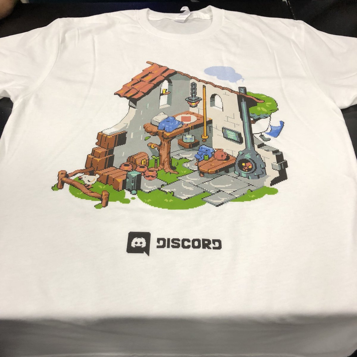 discord's tweet image. We got some spare shirts from PAX South to give away! Reply with some dank pixel art for a chance to win. We'll pick three winners at random.