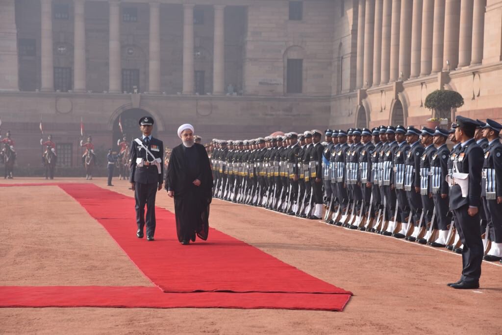 MEAIndia's tweet photo. First visit by an Iranian President in 10 years!  Ceremonial welcome accorded to President of Iran, Dr. Hassan Rouhani @rashtrapatibhvn. President Ram Nath Kovind and PM @narendramodi welcomed President Rouhani.  #DustemanIran https://t.co/OkjyIsapQ2