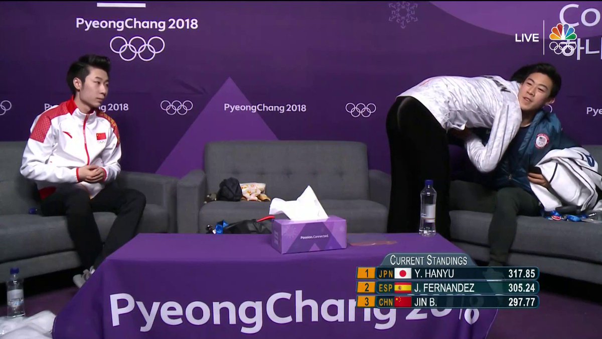 NBCOlympics's tweet image. Yuzuru Hanyu shows @nathanwchen some love for his performance after he's officially knocked off the podium by Spain's Javier Fernandez. #WinterOlympics #BestOfUS