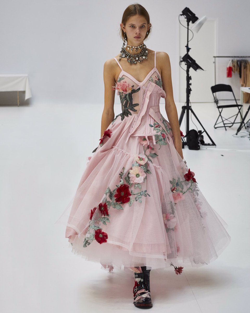 A deconstructed corset dress with trailing garden flower embroideries ...