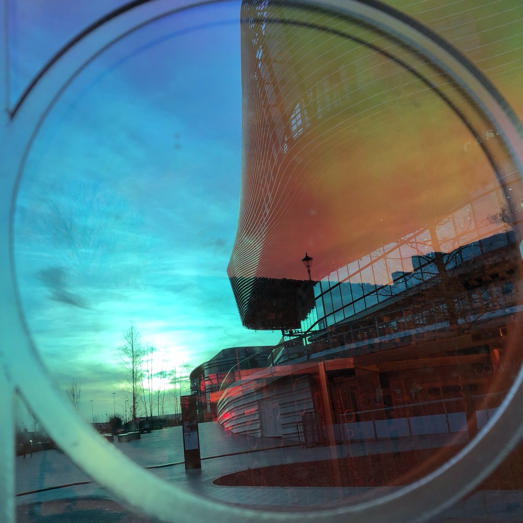 jenniferraw's tweet photo. The Festival of Light was also a great colourful delight! Managed to catch these iridescent walls at sunset #letlightinwq @westquay #southampton https://t.co/orCXDBIe3W