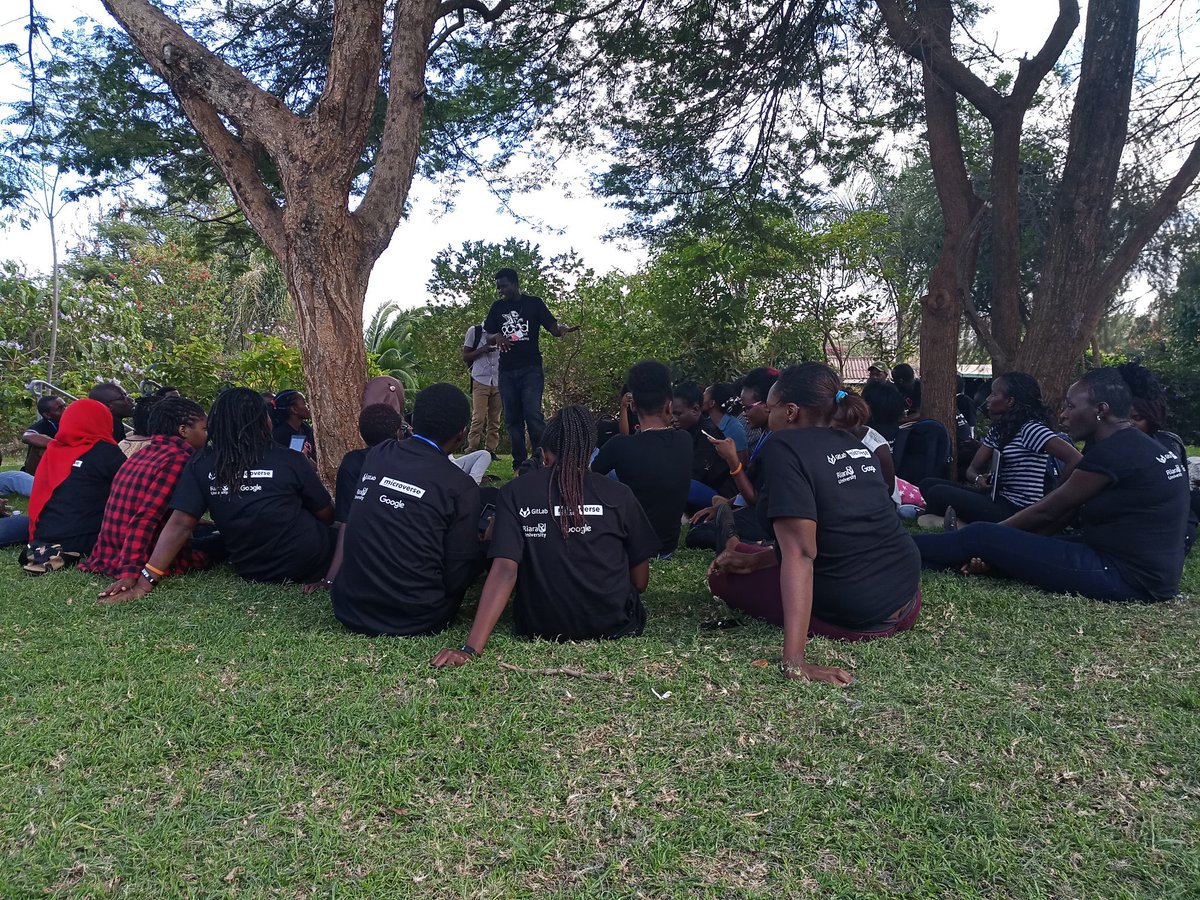 RailsGirlsnbo's tweet photo. Lightning talks under a tree #RailsGirlsNairobi #megacoding https://t.co/69cvtRxaJa