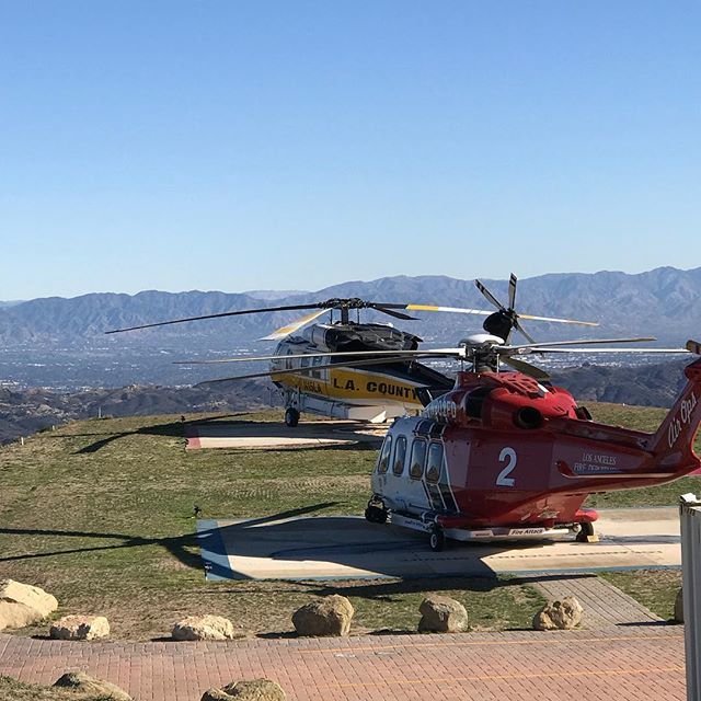 Two birds on a mountaintop on a dazzling mid-winter day in Southern California. Your @losangelesfiredepartment & @lacountyfd train together so we can work together when it counts. 📷: Peter Sanders