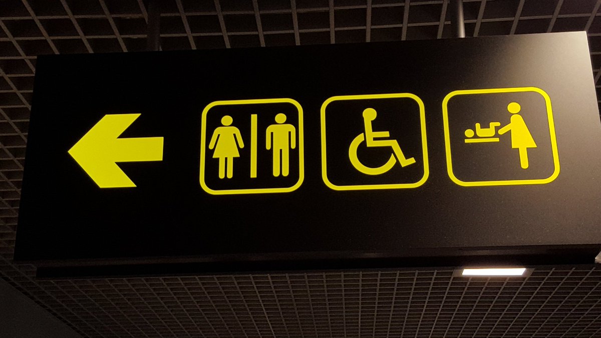 Because men can't change nappies. This is the newest wing at Riga airport. Gates for flights to the 20th century and backwardistan.