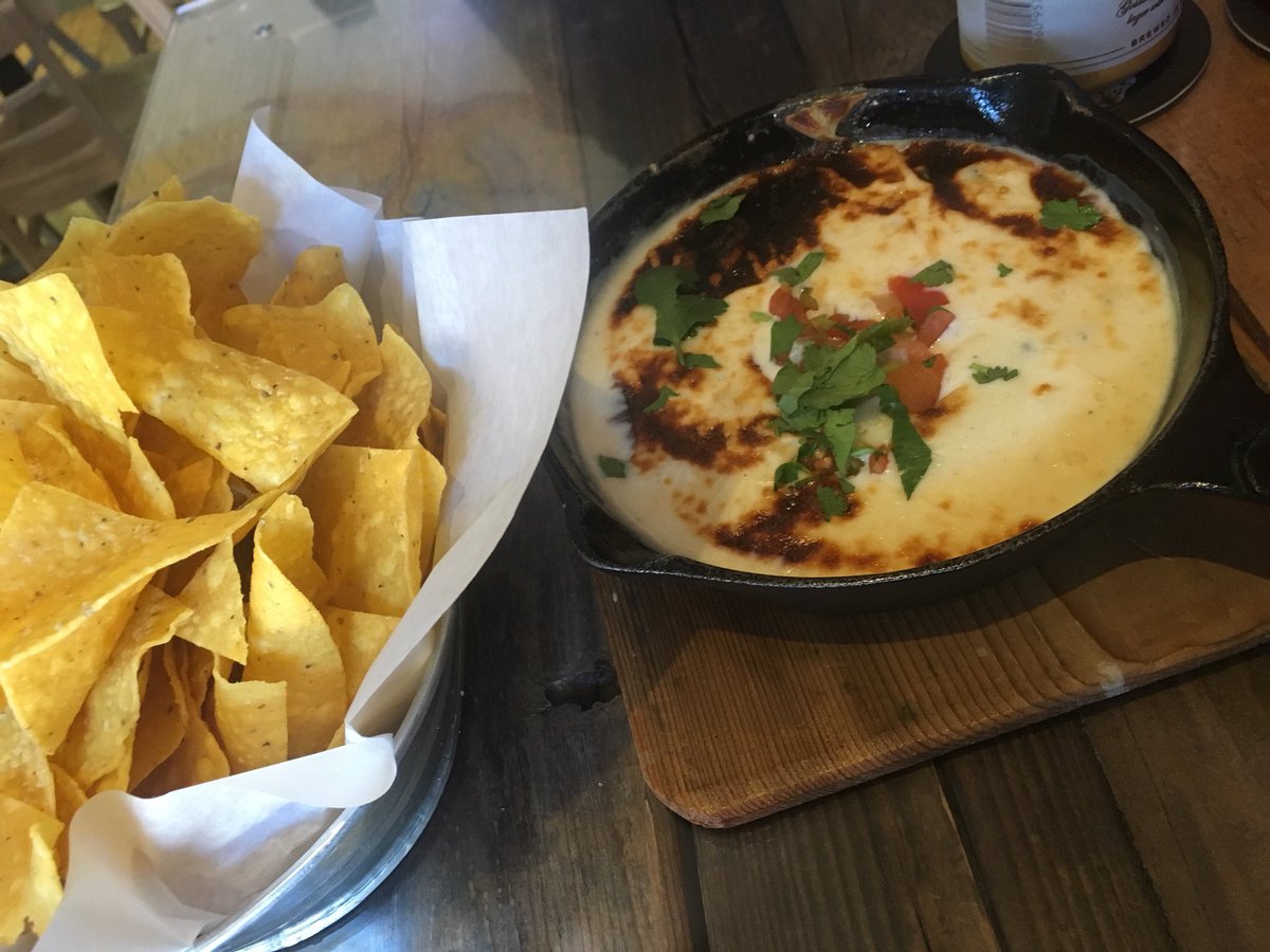 emptynestersat's tweet photo. Love me some real cheese skillet queso and chips! Also, sipped a giant, delicious winter spice mojito! Wonderful taco tavern!  @kctacocompany #chipsandqueso #mojito #tacos https://t.co/0j7i61wWhb