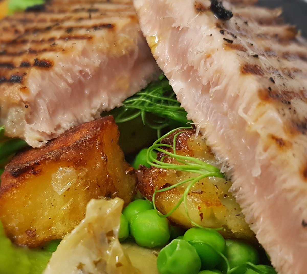 RosebudPub's tweet photo. Delicious Seared Tuna is proving a massive hit with our guests. Served with Pea Puree, Garden Peas, Pea Shoots, Parmentiere Potatoes. 
#foodporn #food #seafood #dinner https://t.co/R5dkrkxJWn