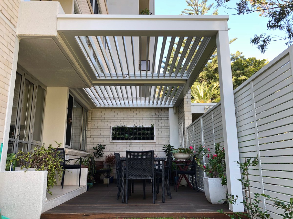 Patioland's tweet photo. Before &amp; after.
Transforming a small &amp; simple courtyard into an outdoor living area with these #louvers https://t.co/24USDNQO3e
