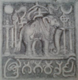 Royal seal of Ganga ruler of Karnataka. Elephant - symbol of Ganga dynasty flanked lamos and surrounded by by royal insignia - Conch, Chakra, shell, fly whisks and Chatra. Sun & moon symbolizing eternal rule of Gangas!