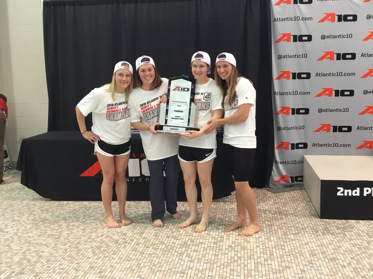 GoDuquesne's tweet photo. 2018 Swimming &amp; Diving Champs! 🏆

#A10Champs #GoDukes #CelebratoryDip #DuqSwimDive #Hardware #WeAreTheChampions https://t.co/9orboAG3Gt