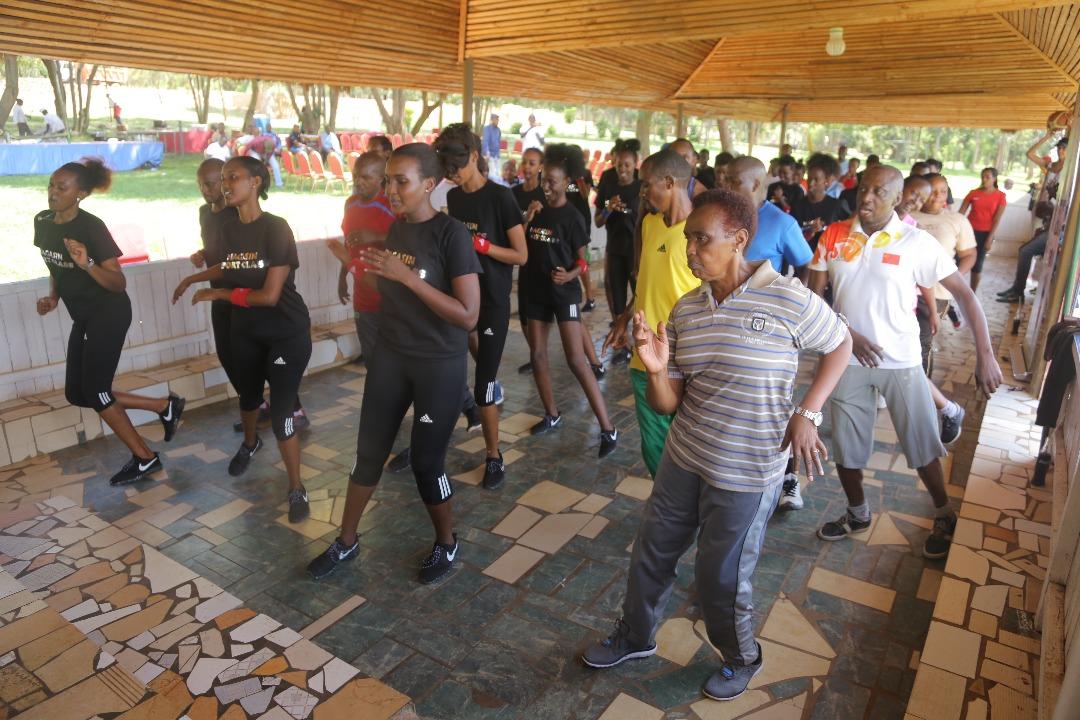 MissRwandaDotRW's tweet photo. Their visit to Gashora coincided with a morning physical exercise session by @PalisseHotels staff. #MissRwanda2018 contestants expressed their interest and finally joined them in stretching. Photo Credit: @Luqman_Mahoro https://t.co/5vbfoCva3c