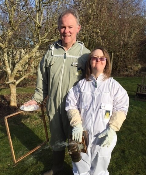 Together with my new assistant and trainee beekeeper - took advantage of the good weather today to give the bees a little more fondant. <a href="/britishbee/">BBKA</a> <a href="/DSAInfo/">Down's Syndrome Association</a>