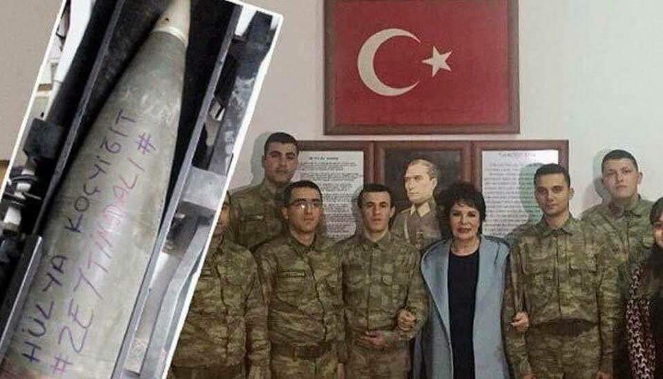hussedogru's tweet image. Turkish artists are starting to write their names on bombs that fall over civilians in #Afrin. Actress Hülya Koçyiğit poses with the military and is ready to send a "greeting" to the civilians in Afrin. 
#FightFascism