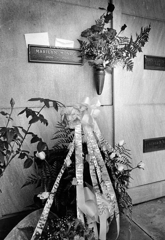 A very special photo taken on the 20th anniversary of Marilyn’s death in 1982. By coincidence on this very same day, four fans arrived at her grave side to leave floral tributes. Although they weren’t known to one another they began to talk about their love for Marilyn...