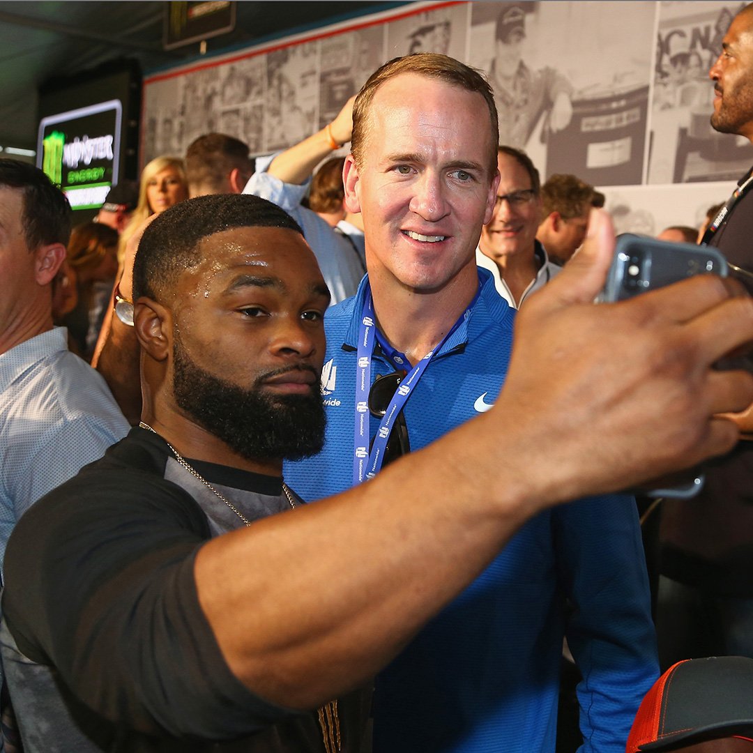 Tyron Woodley and Peyton Manning with a championship selfie. #DAYTONA500